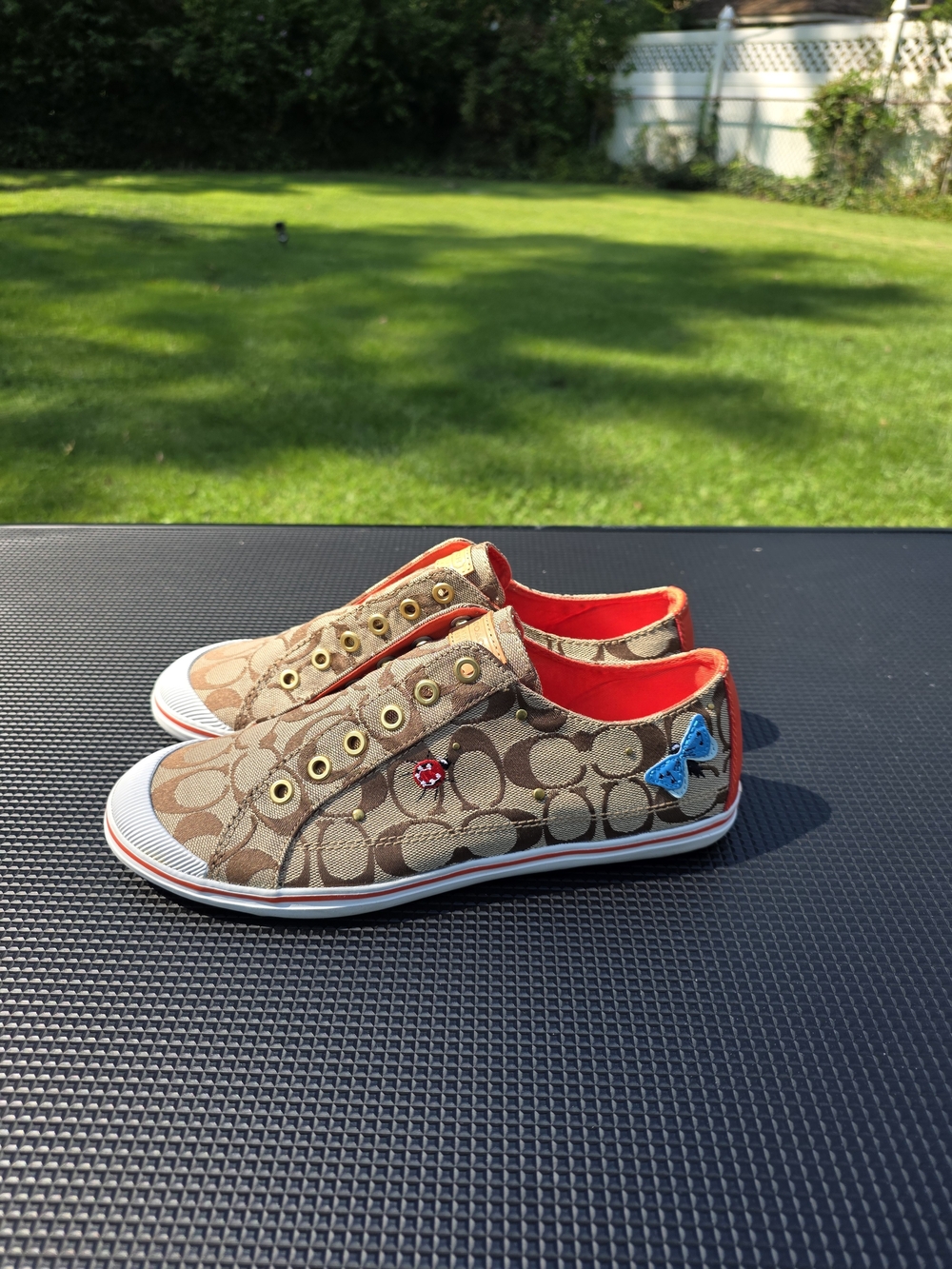 Coach Signature Canvas Slip-On Sneakers in Brown